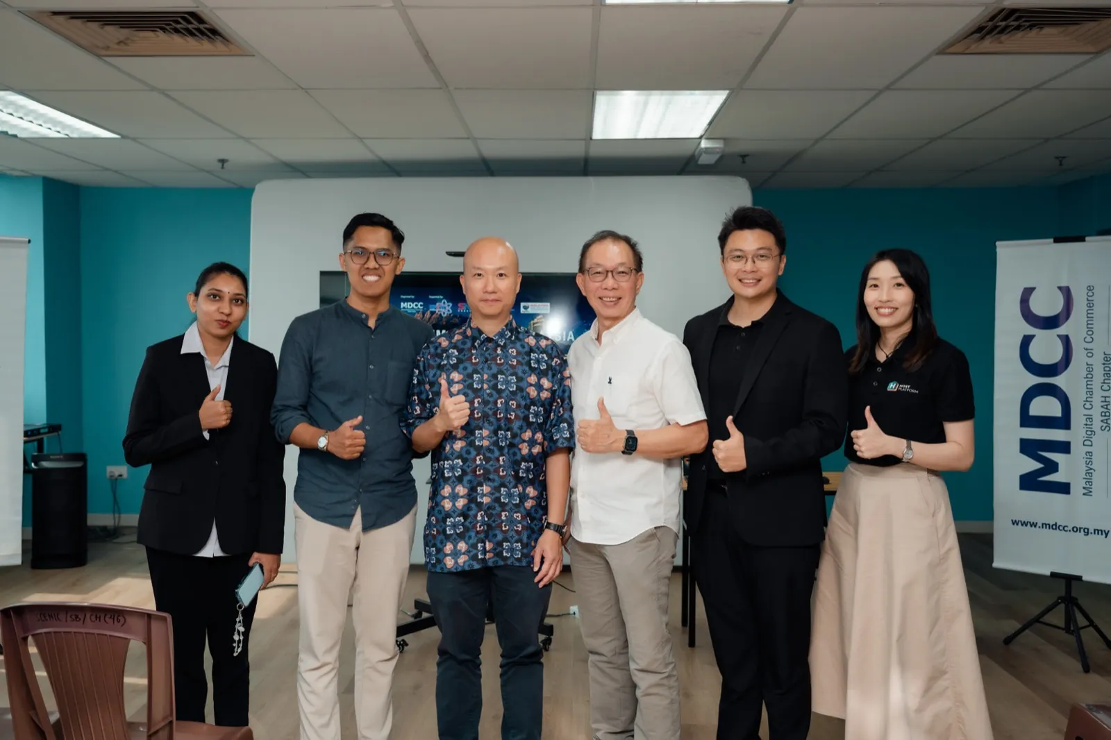 OC Global Technology team with MDCC Sabah Chapter representatives at the Pre-Forum Session